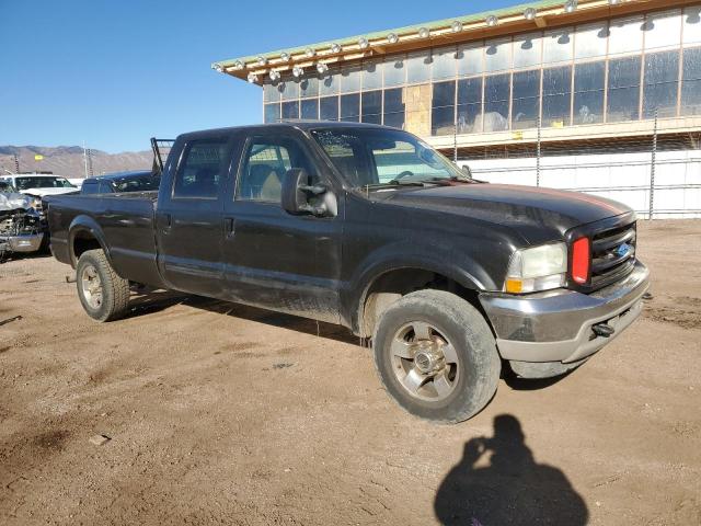 1FTSW31P74EC90377 - 2004 FORD F350 SRW SUPER DUTY BLACK photo 4