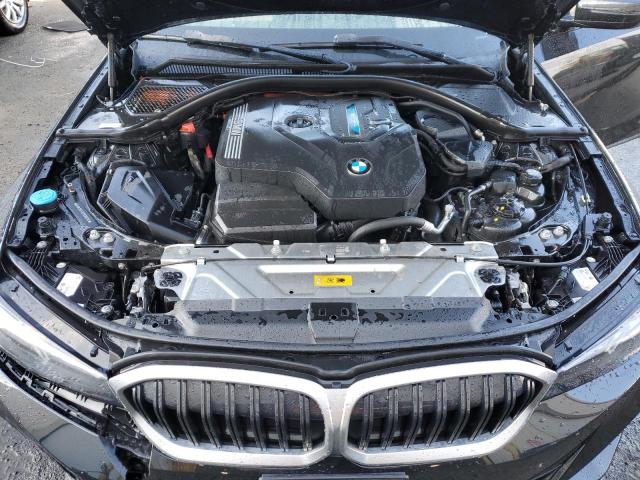 3MW39FF02P8C89974 - 2023 BMW 330E BLACK photo 11