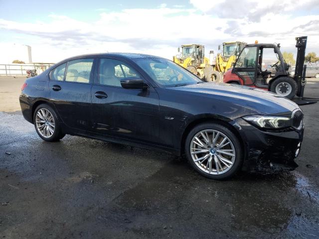 3MW39FF02P8C89974 - 2023 BMW 330E BLACK photo 4