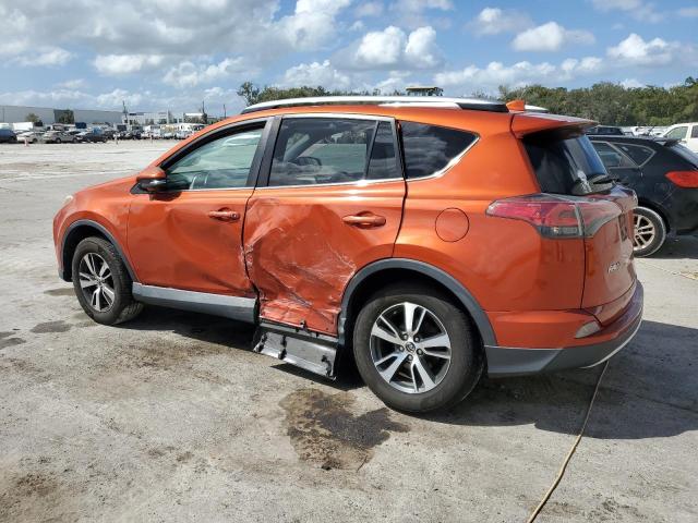 2T3WFREV1GW263203 - 2016 TOYOTA RAV4 XLE ORANGE photo 2