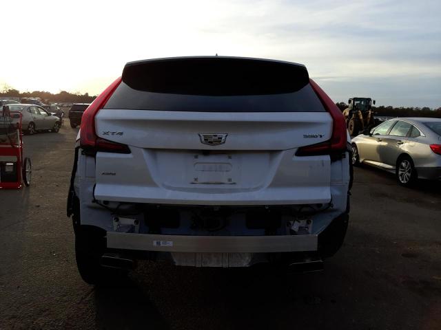 1GYFZBR43MF081395 - 2021 CADILLAC XT4 LUXURY WHITE photo 6