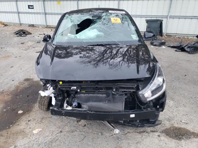 3KPA24AD6PE554457 - 2023 KIA RIO LX BLACK photo 5