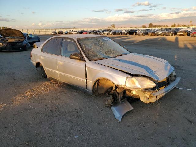 2HGEJ6611YH595066 - 2000 HONDA CIVIC BASE SILVER photo 4