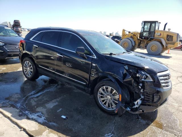 1GYKNCRS0KZ231537 - 2019 CADILLAC XT5 LUXURY BLACK photo 4