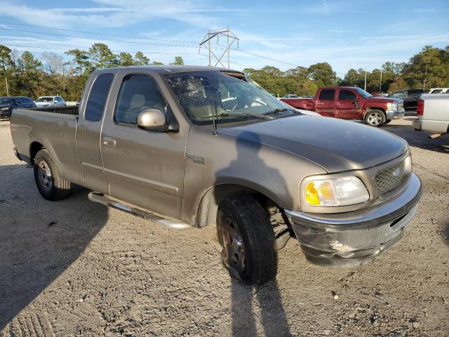 1FTRX17212NB28740 - 2002 FORD F150 BROWN photo 4