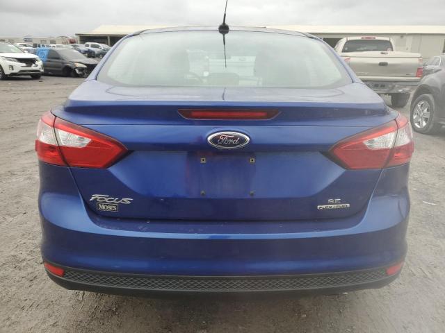 1FAHP3F29CL370607 - 2012 FORD FOCUS SE BLUE photo 6