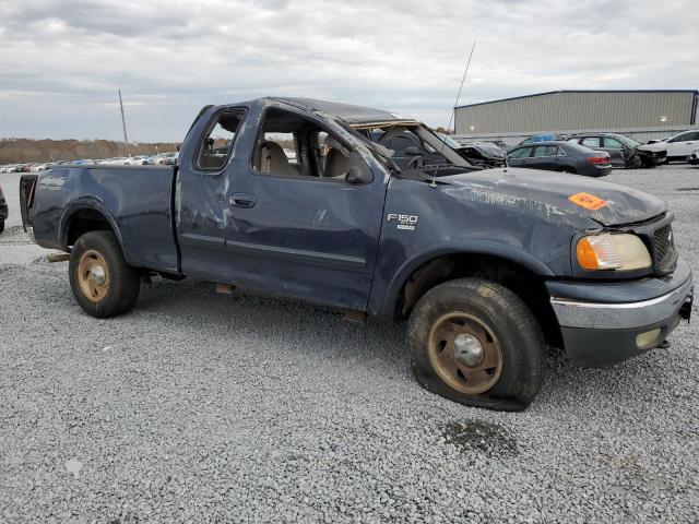 1FTRX18L9YNB08347 - 2000 FORD F150 BLUE photo 4