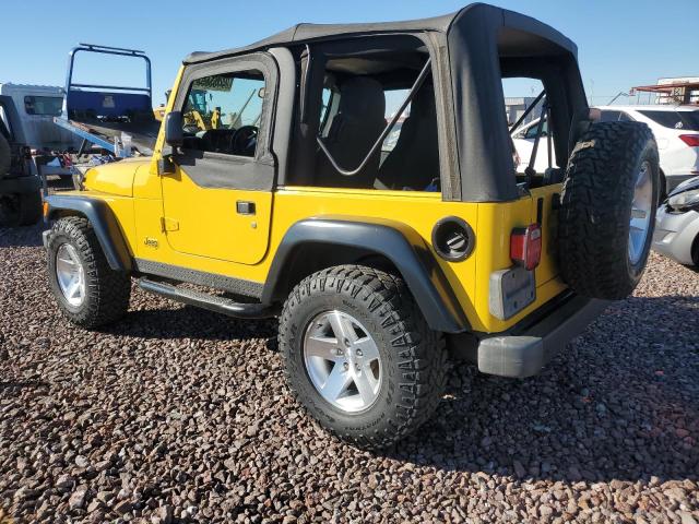 1J4FA69SX4P704678 - 2004 JEEP WRANGLER / RUBICON YELLOW photo 2