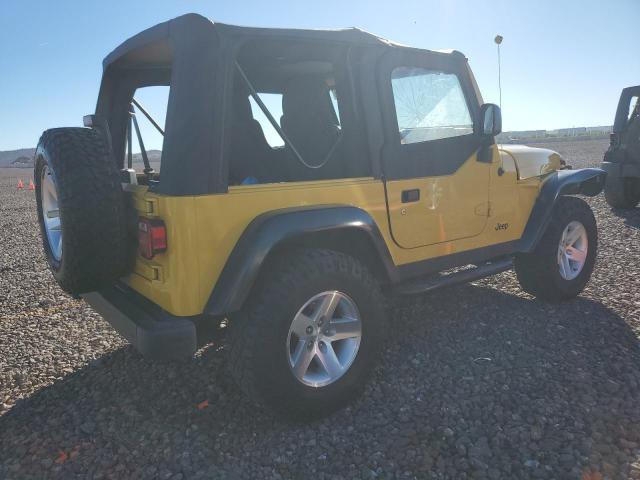 1J4FA69SX4P704678 - 2004 JEEP WRANGLER / RUBICON YELLOW photo 3