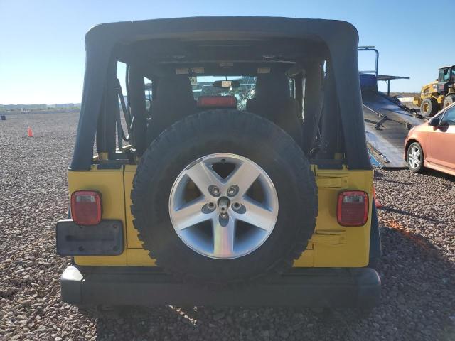 1J4FA69SX4P704678 - 2004 JEEP WRANGLER / RUBICON YELLOW photo 6