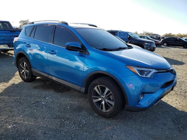 JTMRFREVXJD234543 - 2018 TOYOTA RAV4 ADVENTURE BLUE photo 4