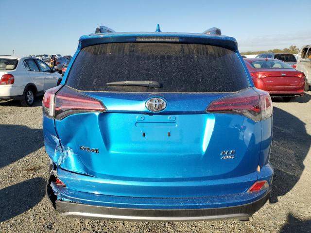 JTMRFREVXJD234543 - 2018 TOYOTA RAV4 ADVENTURE BLUE photo 6