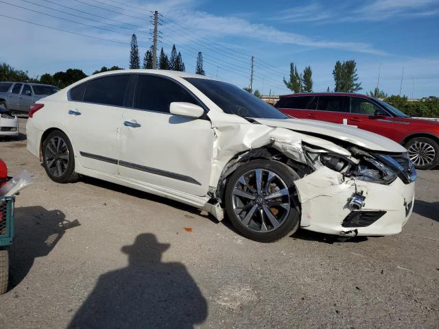 1N4AL3AP6GC277131 - 2016 NISSAN ALTIMA 2.5 WHITE photo 4