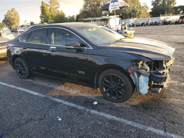 3FA6P0PU0HR191242 - 2017 FORD FUSION SE PHEV BLACK photo 4