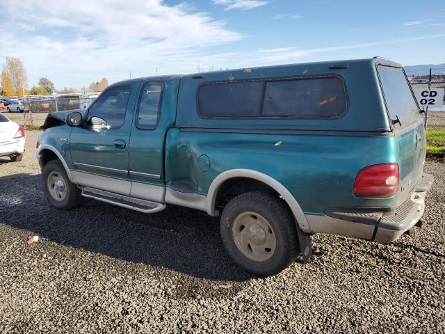 1FTDX0863VKA17554 - 1997 FORD F150 GREEN photo 2