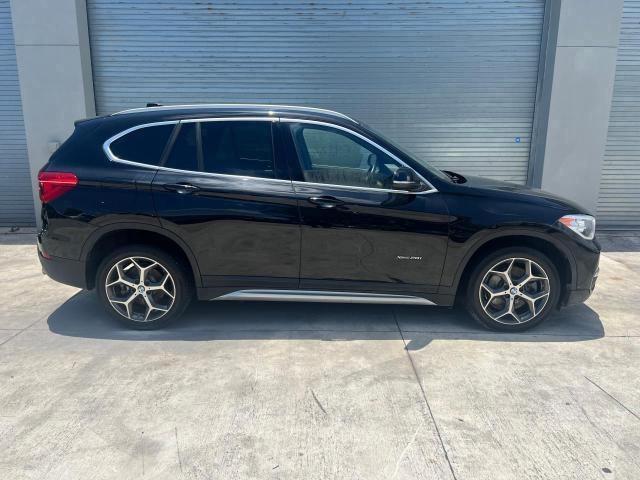 WBXHT3C30J5K24636 - 2018 BMW X1 XDRIVE28I BLACK photo 13