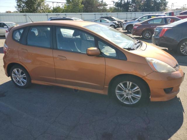 JHMGE8H67BS008769 - 2011 HONDA FIT SPORT ORANGE photo 4