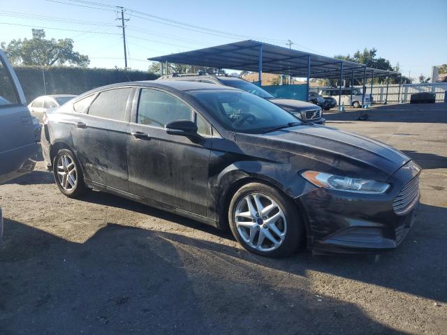 3FA6P0H70ER122877 - 2014 FORD FUSION SE BLACK photo 4