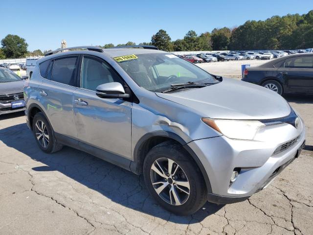 2T3WFREV4HW370425 - 2017 TOYOTA RAV4 XLE SILVER photo 4