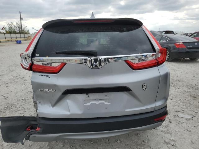 2HKRW5H38KH420046 - 2019 HONDA CR-V LX SILVER photo 6