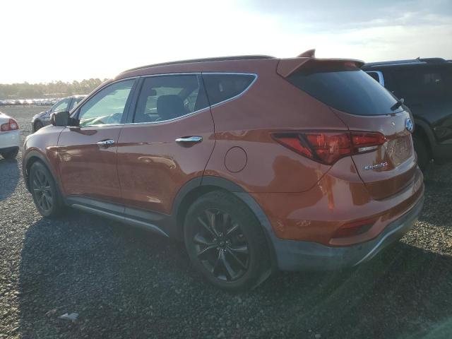 5XYZW4LA3HG423145 - 2017 HYUNDAI SANTA FE S ORANGE photo 2