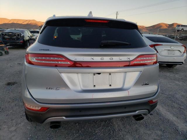 5LMCJ1C93GUJ11065 - 2016 LINCOLN MKC PREMIERE SILVER photo 6