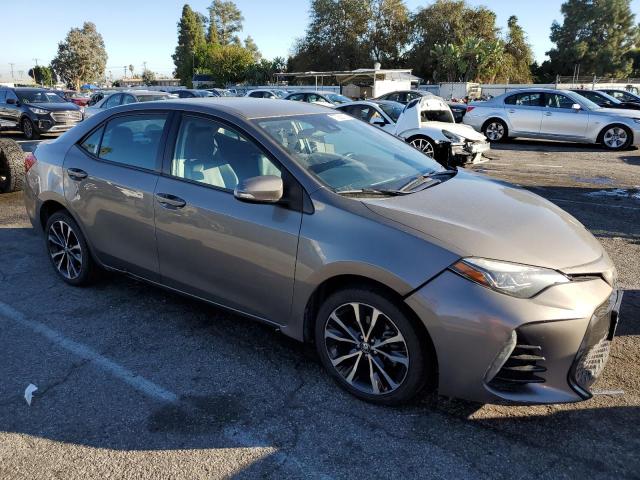 5YFBURHE5HP657718 - 2017 TOYOTA COROLLA L GRAY photo 4