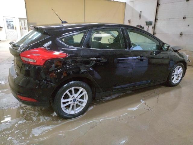 1FADP3K29HL204311 - 2017 FORD FOCUS SE BLACK photo 3