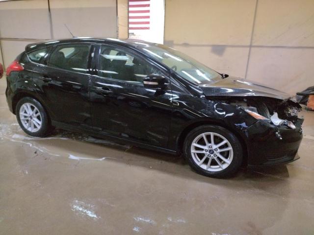 1FADP3K29HL204311 - 2017 FORD FOCUS SE BLACK photo 4