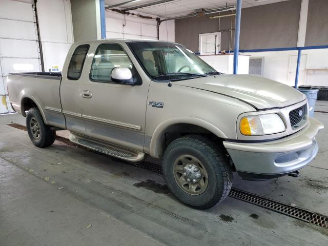 1FTFX28W5VKD22431 - 1997 FORD F250 BEIGE photo 4