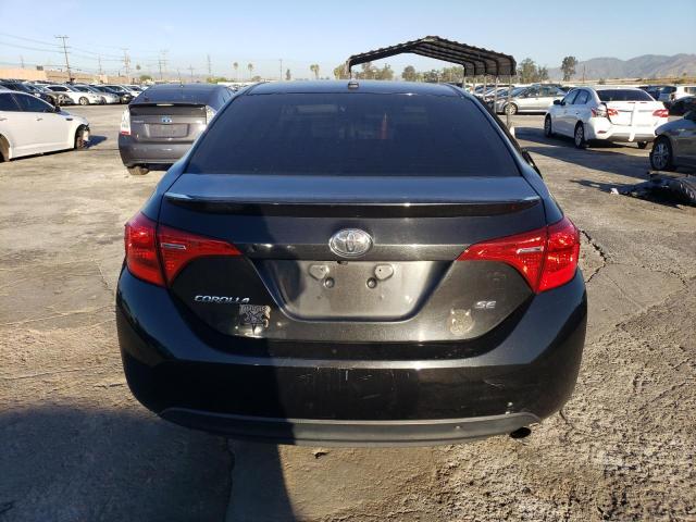 5YFBURHE9HP670679 - 2017 TOYOTA COROLLA L BLACK photo 6