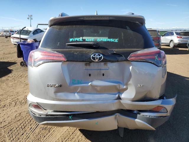 JTMNFREV2JD120910 - 2018 TOYOTA RAV4 SE SILVER photo 6