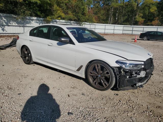 WBAJB9C57KB288727 - 2019 BMW M550XI WHITE photo 4