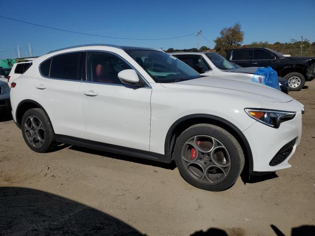 ZASPAKBN2K7C49899 - 2019 ALFA ROMEO STELVIO TI WHITE photo 4