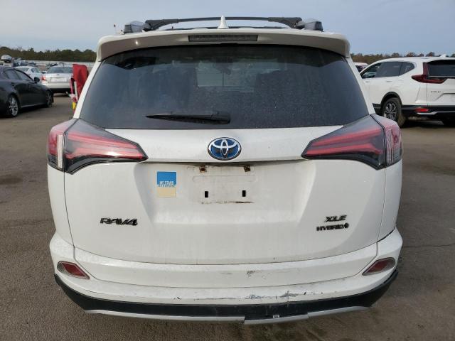 JTMRJREV7JD243991 - 2018 TOYOTA RAV4 HV LE WHITE photo 6