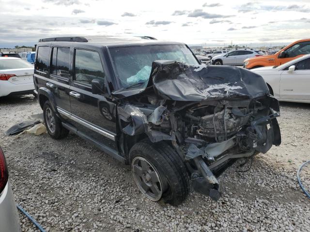 1J8HG48NX6C230716 - 2006 JEEP COMMANDER BLACK photo 4