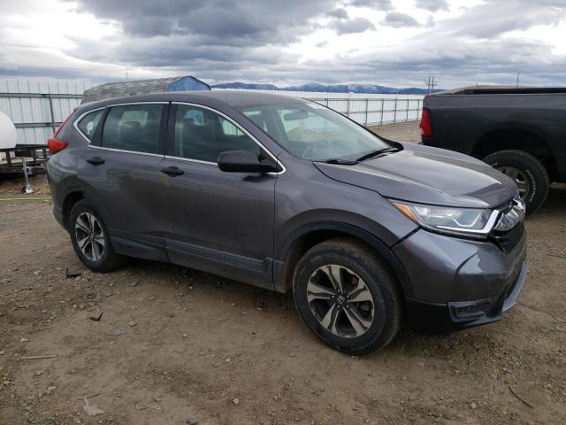 2HKRW6H32JH202415 - 2018 HONDA CR-V LX SILVER photo 4