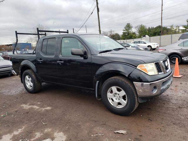 1N6AD07W85C416884 - 2005 NISSAN FRONTIER CREW CAB LE BLACK photo 4