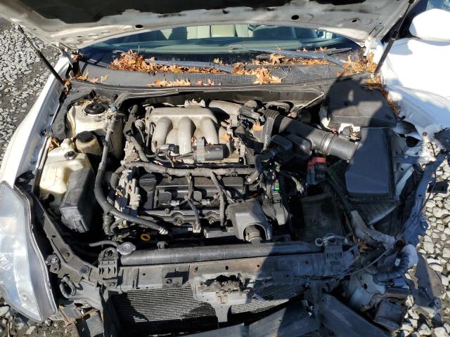 1N4BA41E44C903138 - 2004 NISSAN MAXIMA SE WHITE photo 11