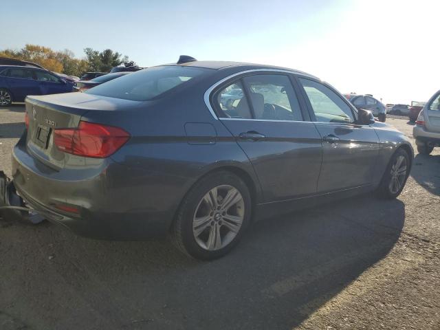 WBA8D9C51JEM33377 - 2018 BMW 330 XI GRAY photo 3