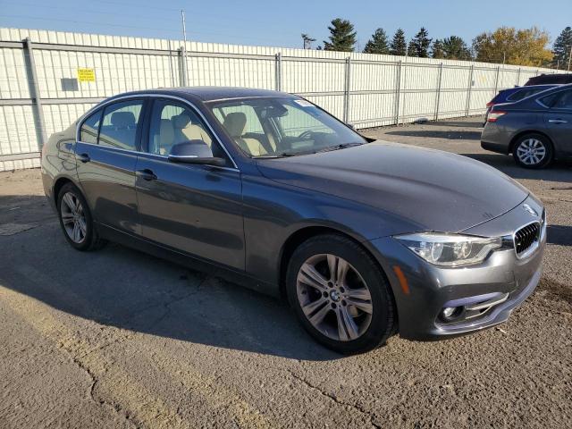 WBA8D9C51JEM33377 - 2018 BMW 330 XI GRAY photo 4