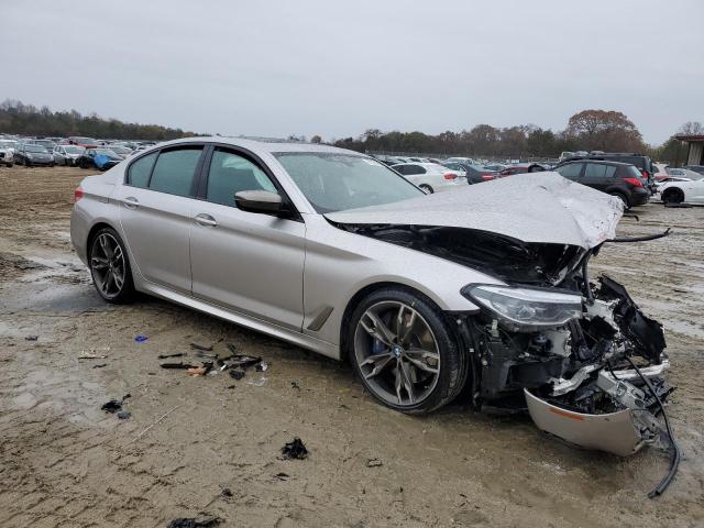 WBAJB9C51KB289243 - 2019 BMW M550XI SILVER photo 4