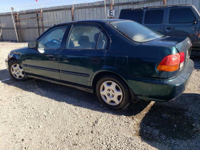 1HGEJ6523VL030911 - 1997 HONDA CIVIC DX GREEN photo 2