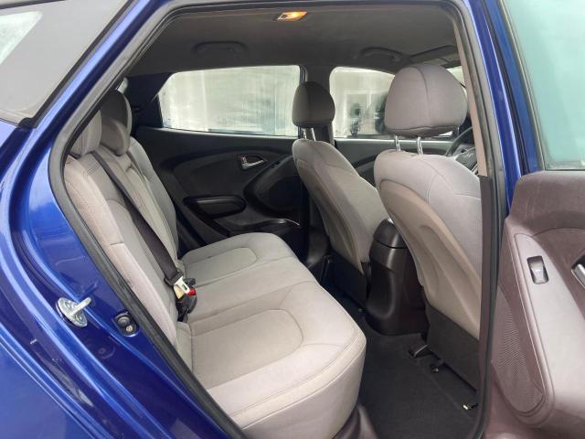 KM8JT3AB3BU242804 - 2011 HYUNDAI TUCSON GL BLUE photo 6