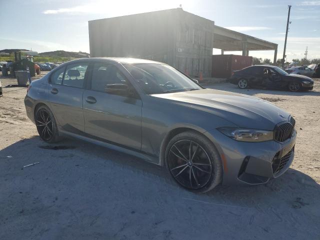 3MW89FF0XP8D64376 - 2023 BMW 330XI GRAY photo 4