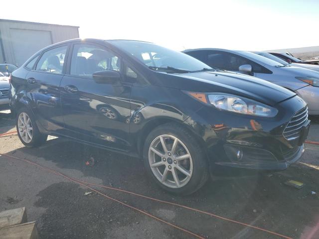 3FADP4BJ4KM149530 - 2019 FORD FIESTA SE BLACK photo 4