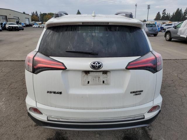 JTMDFREV3HJ171162 - 2017 TOYOTA RAV4 LIMITED WHITE photo 6