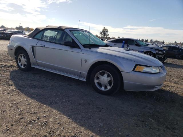 1FAFP4444YF103494 - 2000 FORD MUSTANG SILVER photo 4