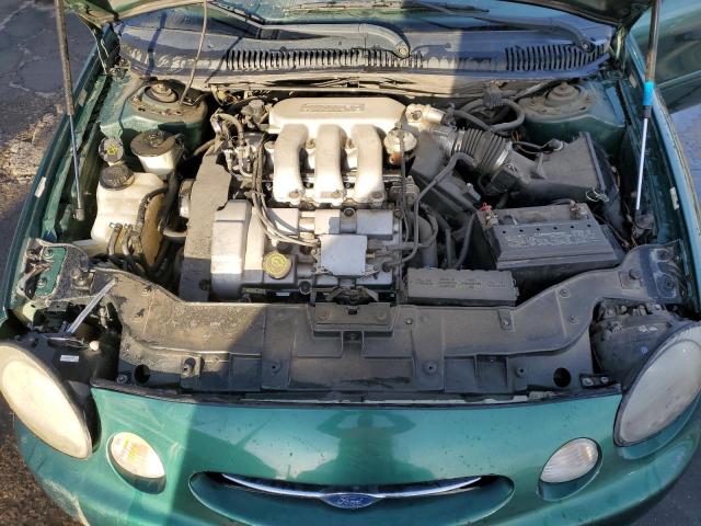 1FAFP53S6XA272708 - 1999 FORD TAURUS SE GREEN photo 11