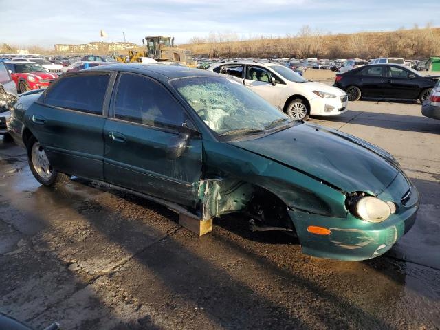 1FAFP53S6XA272708 - 1999 FORD TAURUS SE GREEN photo 4